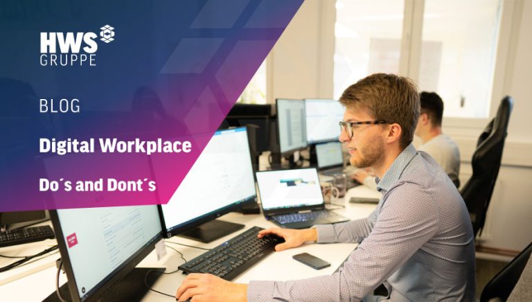 Zwei Mitarbeiter sitzen an einem Modern Workplace und arbeiten dadurch sehr effizient. Bild veranschaulicht Digital Workplace